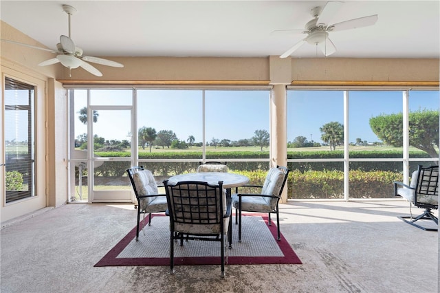 sunroom featuring ceiling fan and a healthy amount of sunlight