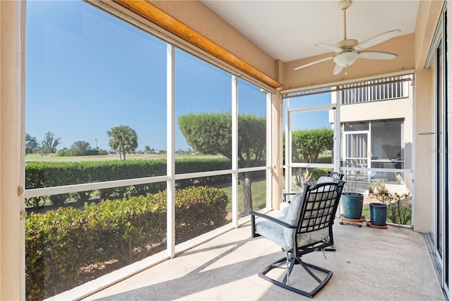 sunroom / solarium with ceiling fan