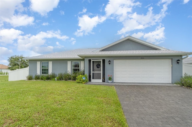 single story home with a front lawn and a garage