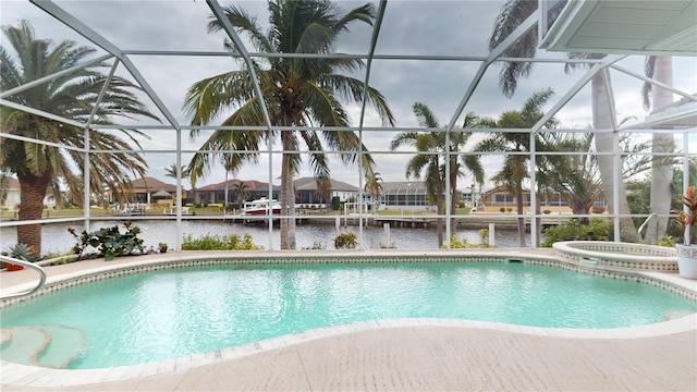 view of swimming pool with a lanai, a water view, and an in ground hot tub