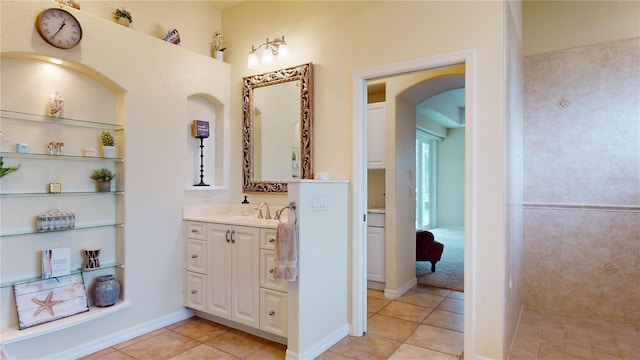 bathroom with vanity and tile patterned flooring