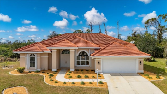 view of front facade with a front yard and a garage