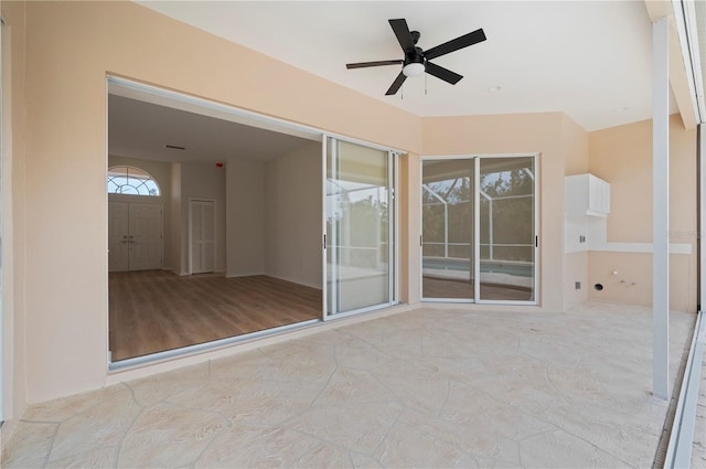 view of patio with ceiling fan