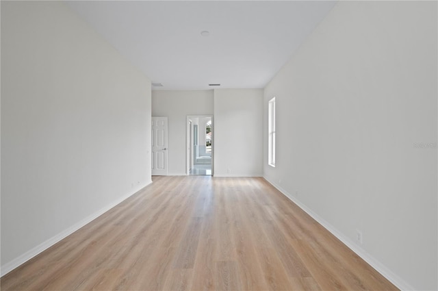 empty room with light wood-type flooring