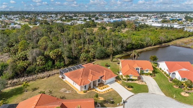 birds eye view of property featuring a water view