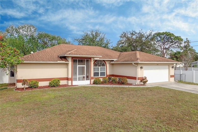 ranch-style home with a front yard and a garage