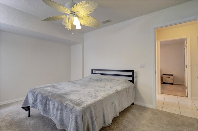 bedroom with ceiling fan and carpet floors