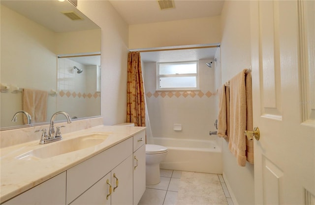 full bathroom featuring vanity, shower / bath combo with shower curtain, tile patterned floors, and toilet