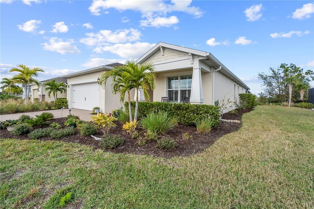 view of property exterior featuring a garage and a yard