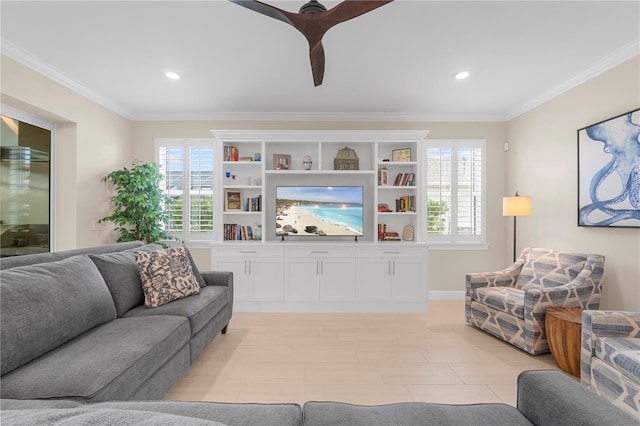 living room with ceiling fan and ornamental molding