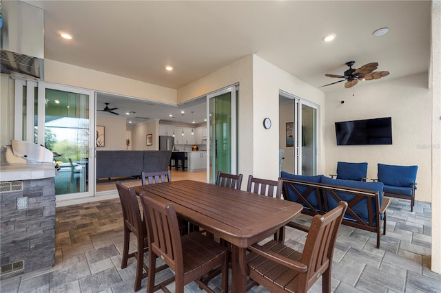 dining space with ceiling fan