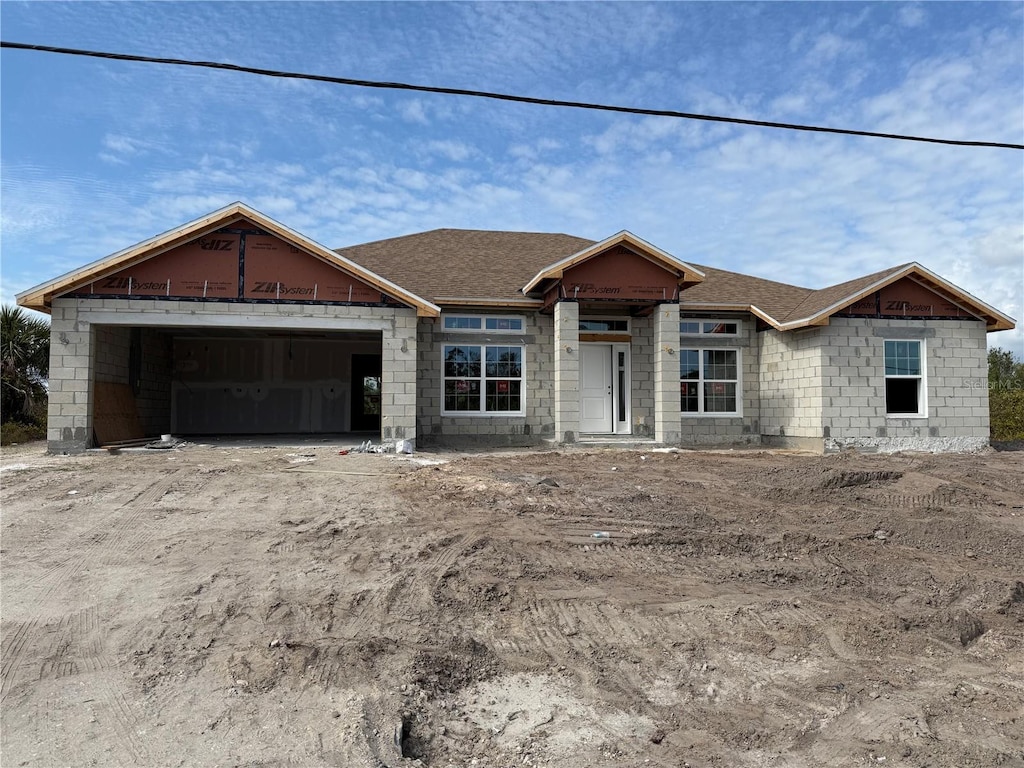 property under construction with a garage