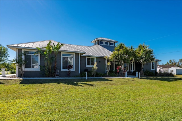 view of front of house with a front yard