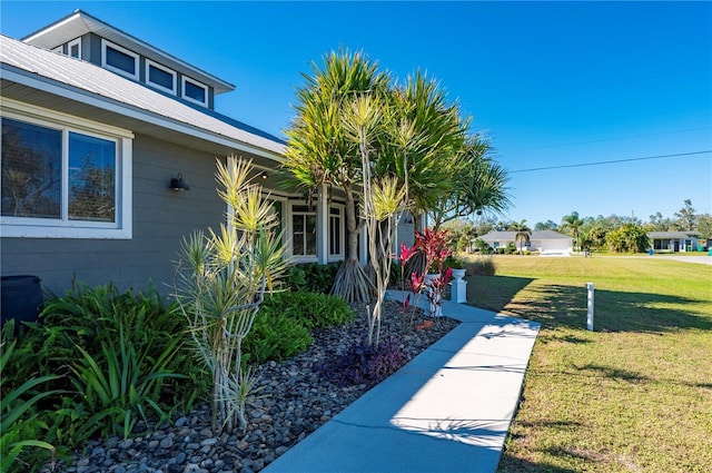 exterior space with a yard