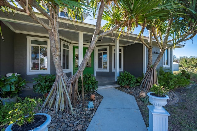 entrance to property featuring a porch