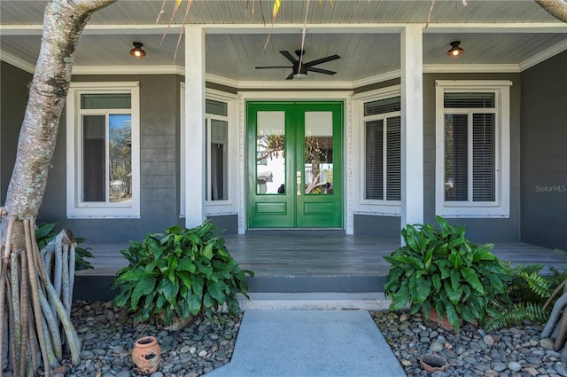 property entrance featuring ceiling fan and french doors