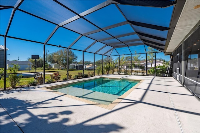 view of pool featuring a lanai and a patio area