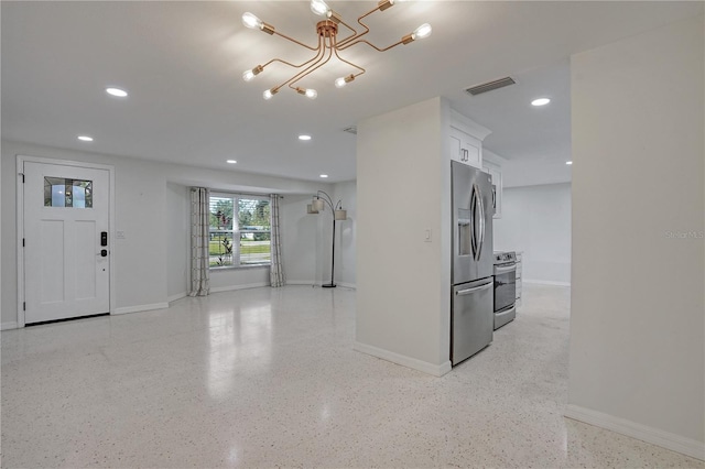 interior space with an inviting chandelier