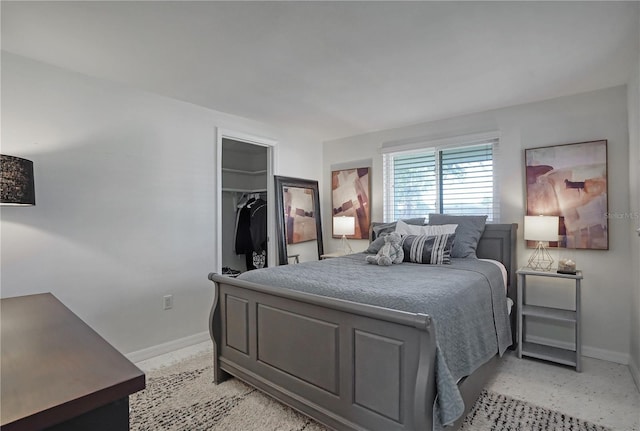 bedroom featuring a closet and a walk in closet