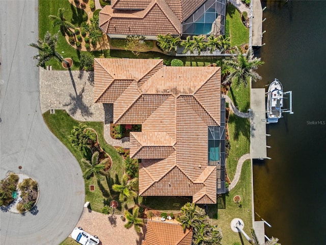 bird's eye view with a water view