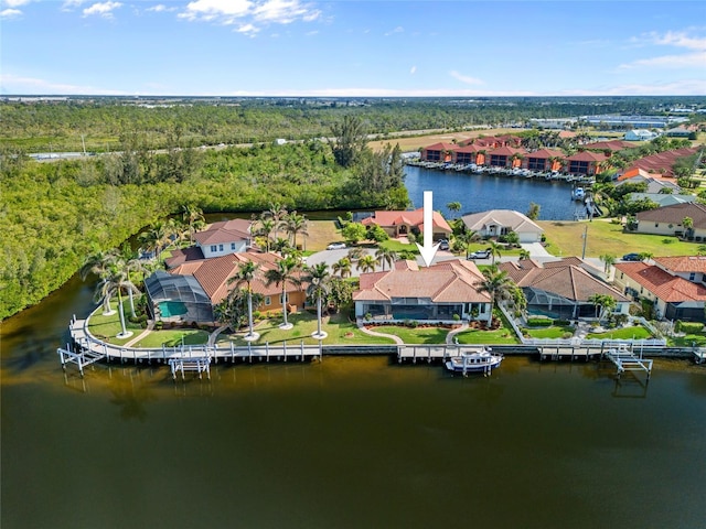 drone / aerial view with a water view