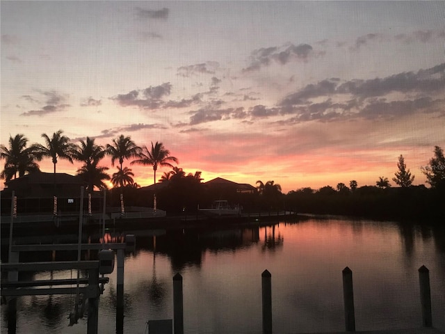 water view featuring a dock