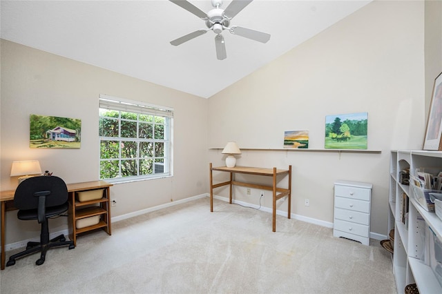 carpeted home office featuring ceiling fan and lofted ceiling