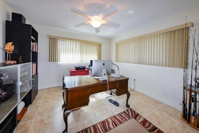 office area with light tile patterned flooring and ceiling fan