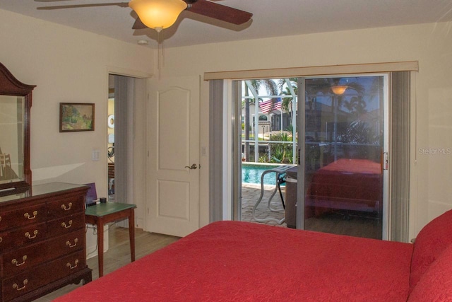 bedroom featuring ceiling fan, access to exterior, and hardwood / wood-style floors