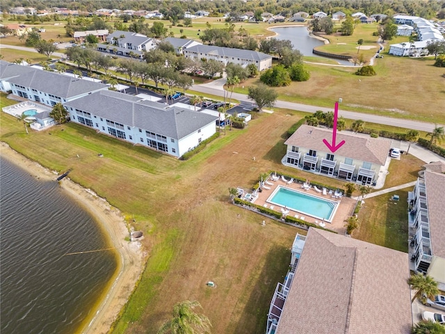 drone / aerial view with a water view