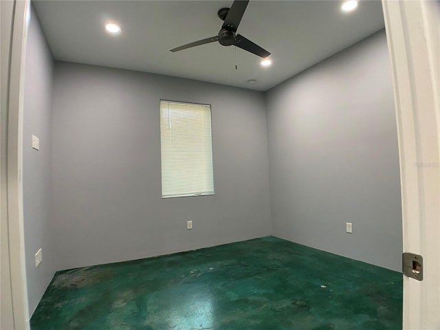 spare room featuring ceiling fan