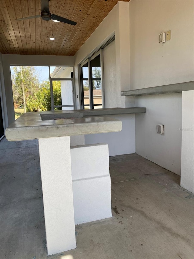 view of patio with ceiling fan