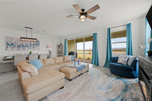 living room featuring ceiling fan