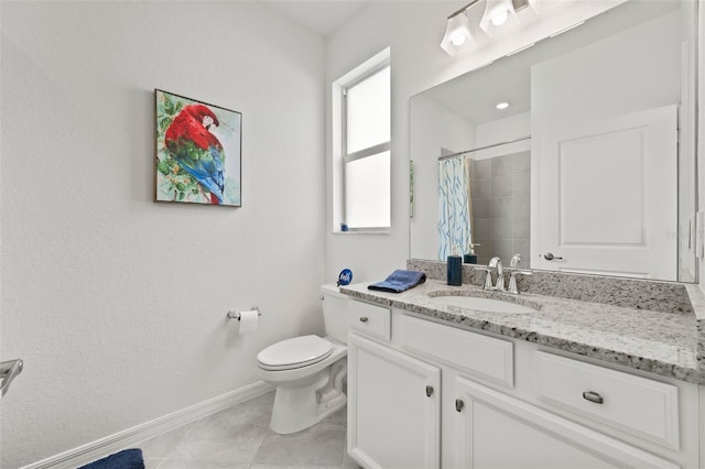 bathroom featuring toilet, plenty of natural light, vanity, and curtained shower