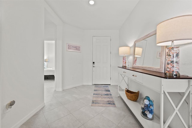 foyer with light tile patterned floors