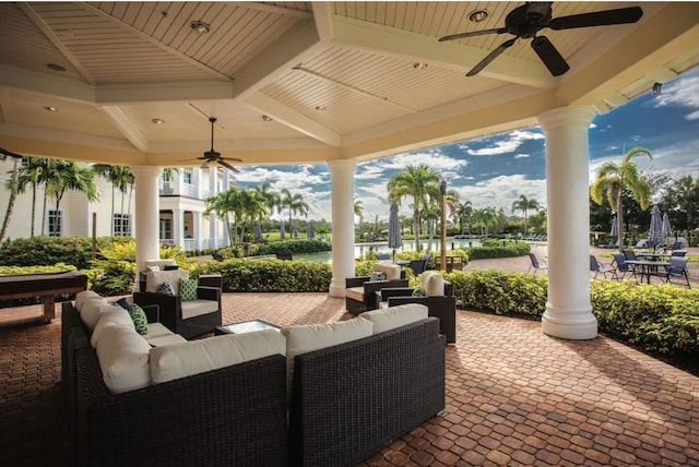 view of patio / terrace featuring ceiling fan, a gazebo, and an outdoor living space