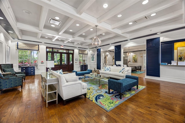 living room featuring dark hardwood / wood-style flooring, beam ceiling, french doors, and coffered ceiling