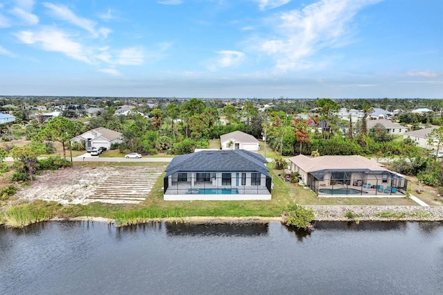 drone / aerial view with a water view