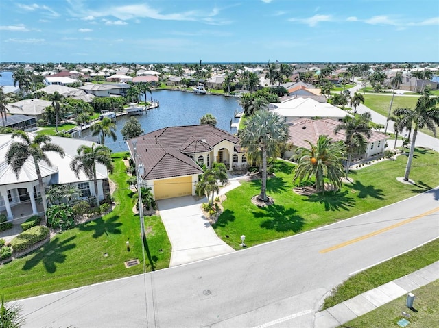 drone / aerial view with a water view