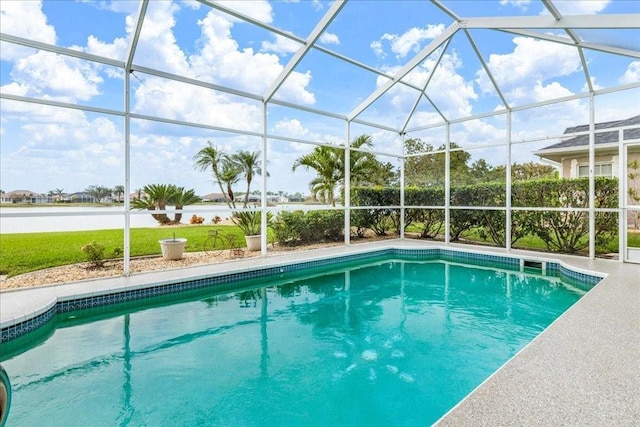 view of swimming pool with a lanai