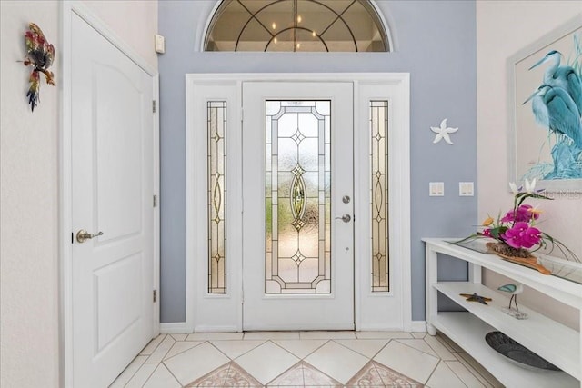 entrance foyer with light tile patterned flooring