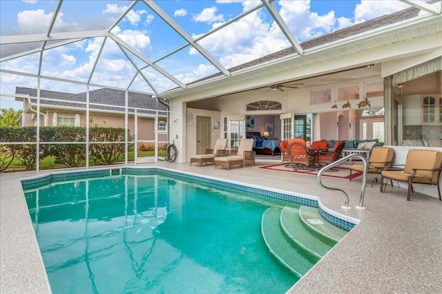 view of swimming pool with a lanai, ceiling fan, a patio area, and outdoor lounge area