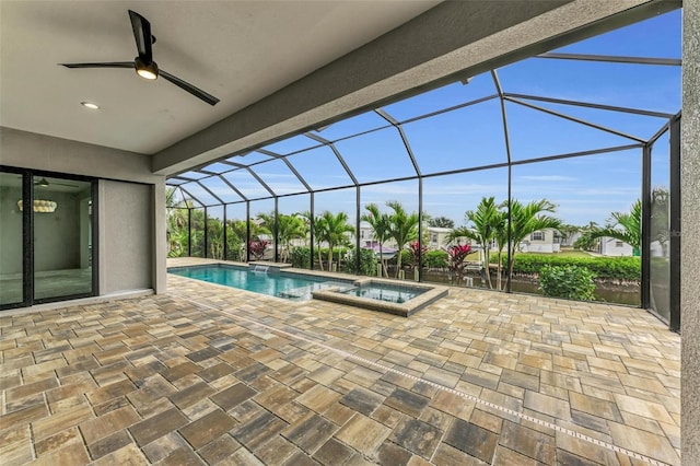 view of swimming pool featuring an in ground hot tub, a patio, and glass enclosure