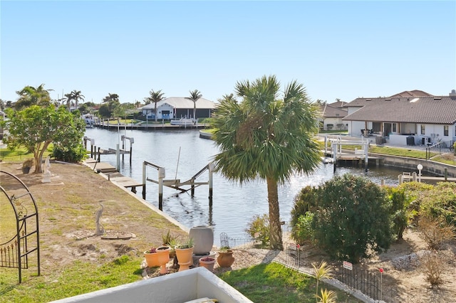 dock area with a water view