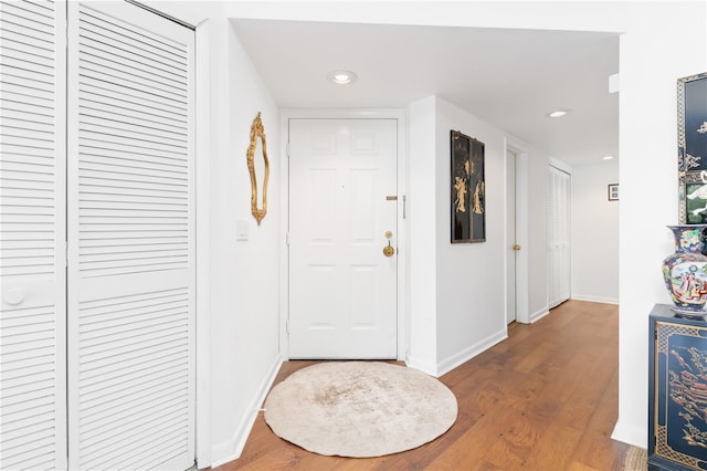 corridor featuring hardwood / wood-style flooring