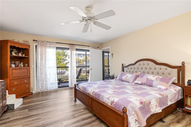 bedroom with ceiling fan, hardwood / wood-style flooring, and access to outside