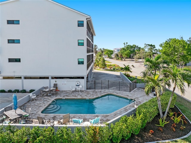 view of pool featuring a patio area