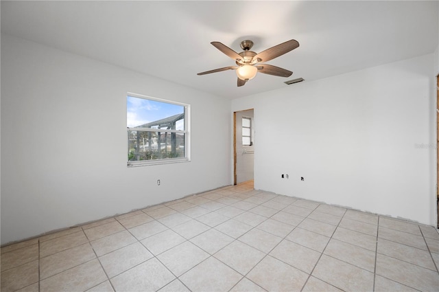 unfurnished room featuring ceiling fan