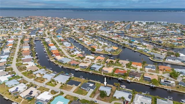 bird's eye view with a water view