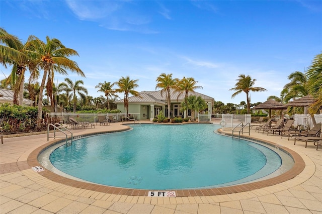 view of swimming pool featuring a patio area